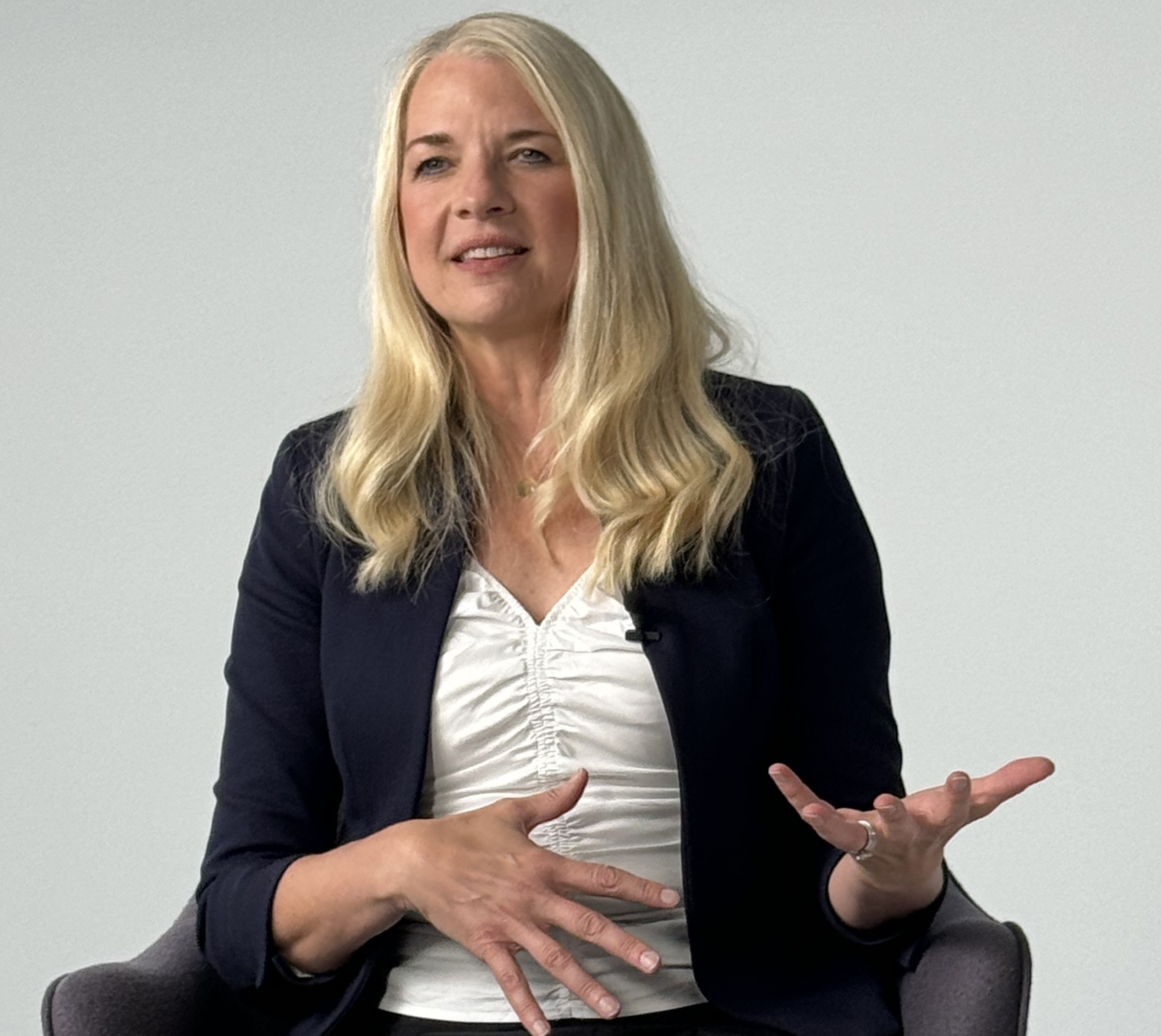 Photo of Dr. Jeffery, a blond woman wearing a white blouse and blue blazer. 